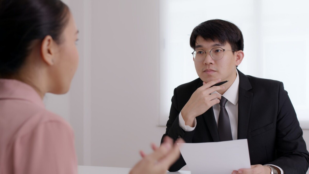 CEO man or HR boss in suit search new hire vacancy labor ask in CV career paper